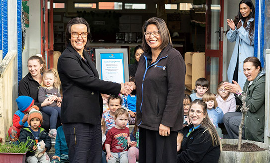 Whānau Āwhina Plunket Chief Executive Fiona Kingsford with BestStart Centre Manager Tagi Ewens, staff and tamariki