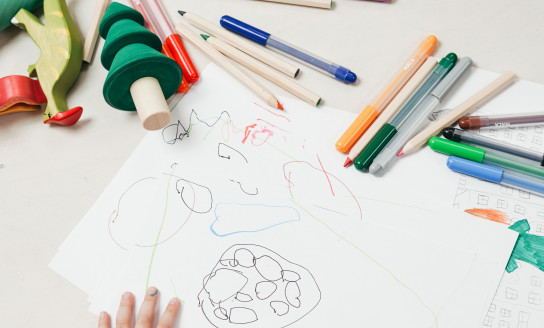 kid on white table painting 3662630